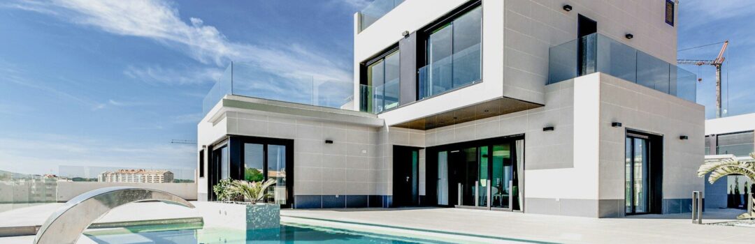 white concrete building under blue sky during daytime